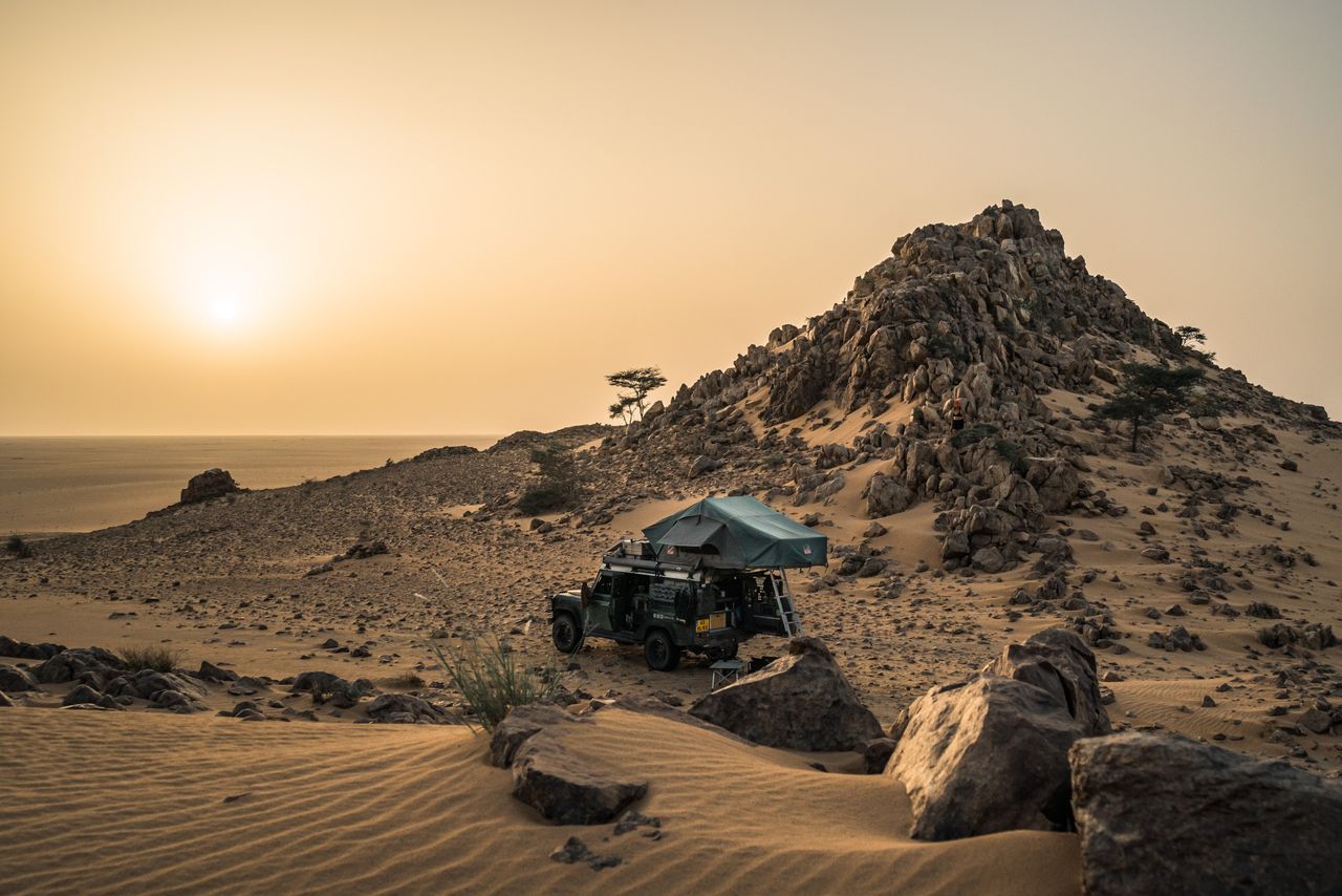 A Trusty Land Rover Defender Rafiki on a desert tour, traversing the Chalbi Desert in search of a special necklace