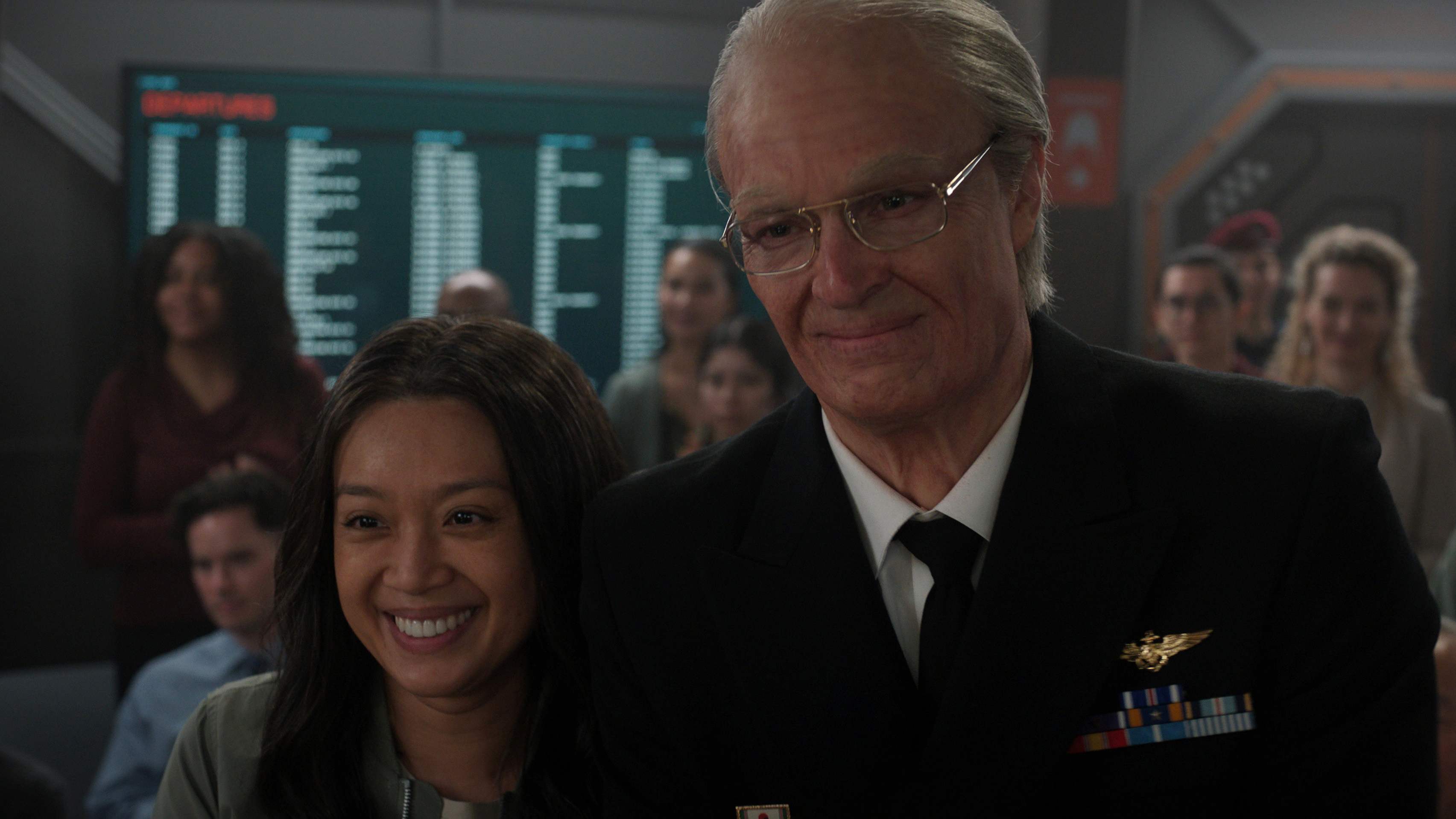 A teaser photo of Cynthy Wu and Joel Kinnaman star in For All Mankind season 5, they're smiling and stood close together