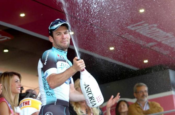 Mark Cavendish (Omega Pharma-Quick Step) opens the spumante