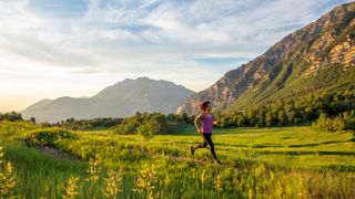 A woman enjoys a summer afternoon and evening running on a trail in the mountains above Provo, Utah