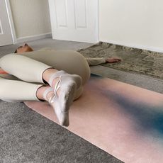 Katie Sims trying a Pilates spine twist supine every day