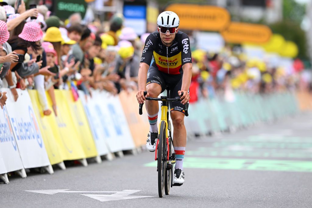 PAU FRANCE JULY 12 Arnaud De Lie of Belgium and Team Lotto Dstny crosses the finish line after being involved in a crash during the 111th Tour de France 2024 Stage 13 a 1653km stage from Agen to Pau UCIWT on July 12 2024 in Pau France Photo by Dario BelingheriGetty Images