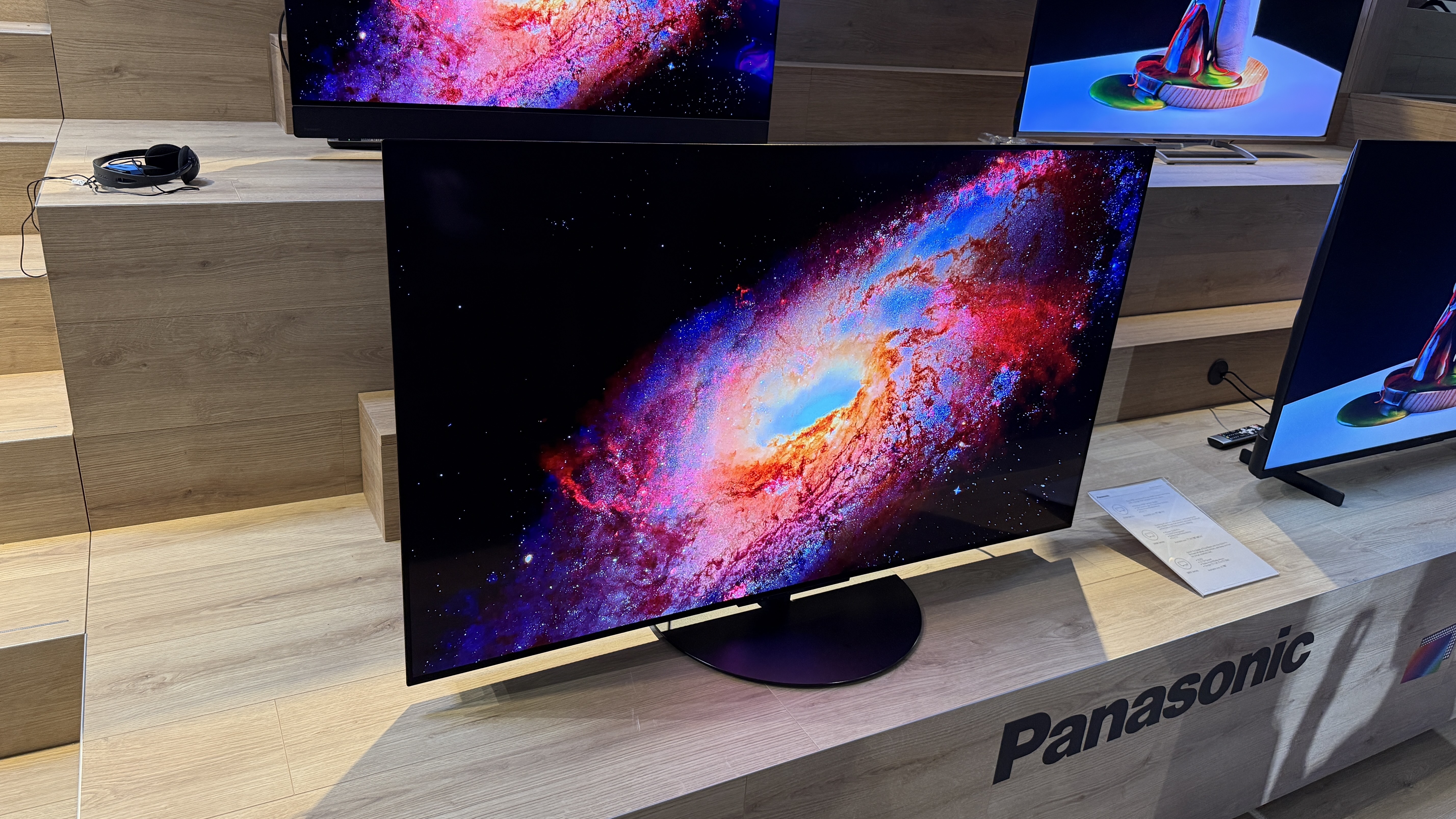 The Panasonic Z86C showing a colorful galaxy against the deep background of space