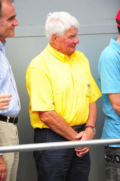 Raymond Poulidor looks on