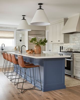 kitchen with island and bar stools