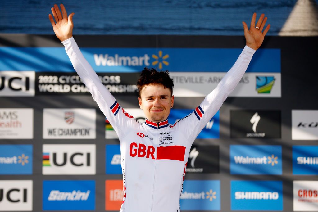 FAYETTEVILLE ARKANSAS JANUARY 30 Gold medalist Thomas Pidcock of The United Kingdom poses on the podium during the medal ceremony after the 73rd UCI CycloCross World Championships Fayetteville 2022 Mens Elite Fayetteville2022 on January 30 2022 in Fayetteville Arkansas Photo by Chris GraythenGetty Images
