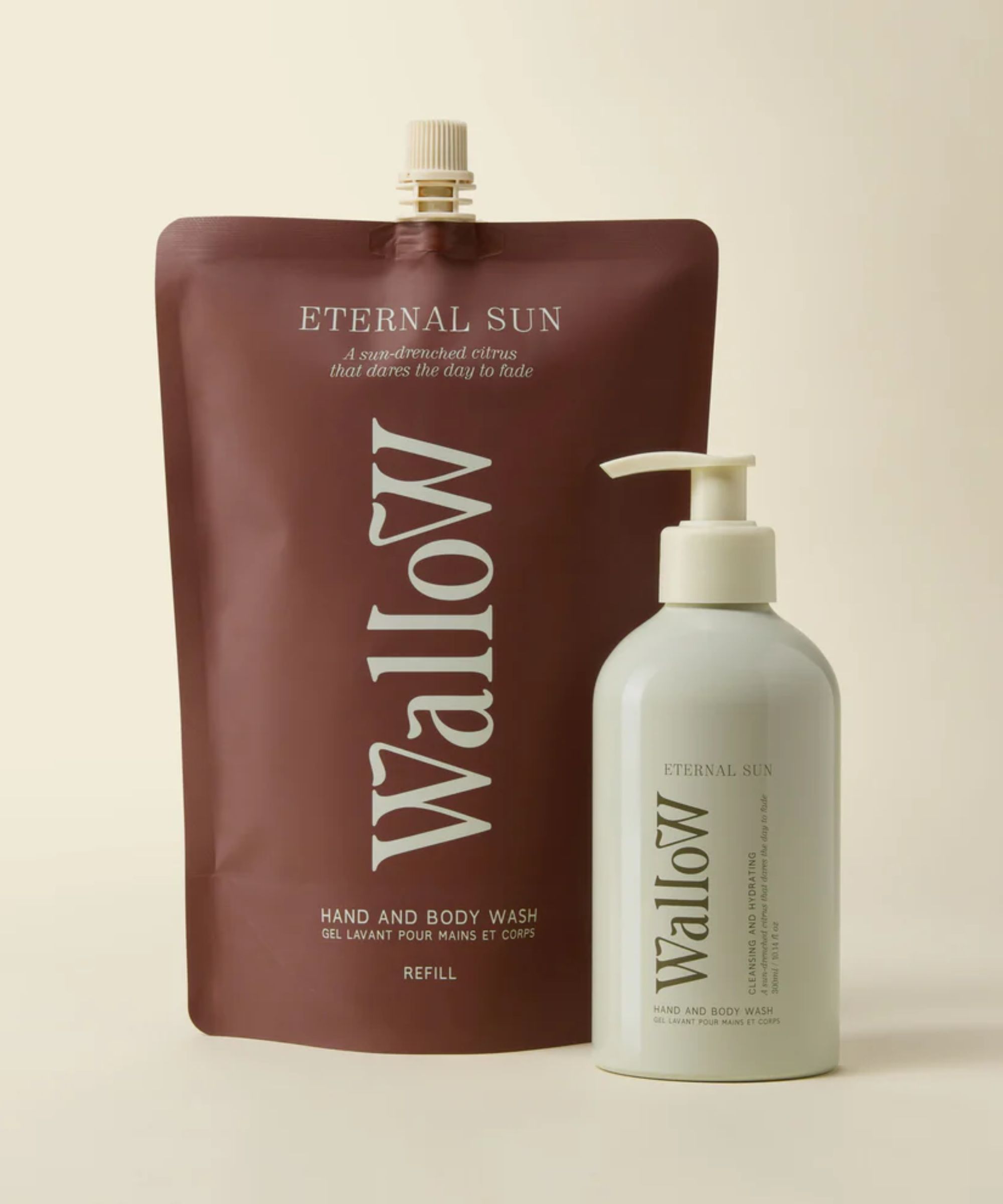 White bottle of body wash with a burgundy refill pouch