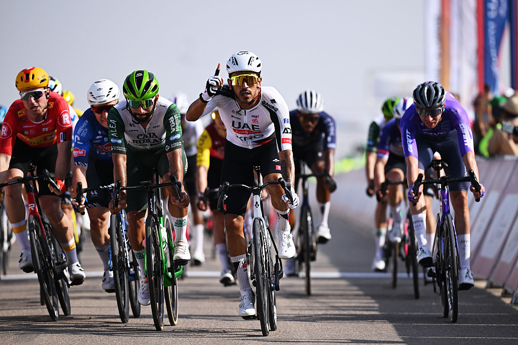 BIMMAH SINKHOLE, OMAN - FEBRUARY 07: Juan Sebastian Molano of Colombia and UAE Team Emirates celebrates at finish line as stage winner ahead of Fernando Gaviria of Colombia and Team Caja Rural-Seguros RGA and Gerben Thijssen of Belgium and Team Alpecin-Premier Tech during the 15th Tour of Oman 2026, Stage 1 a 170.9km stage from Ministry of Tourism to Bimmah Sink Hole on February 07, 2026 in Bimmah sinkhole, Oman. (Photo by Dario Belingheri/Getty Images)