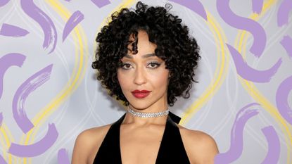 Ruth Negga with one of the best short hairstyles for thick hair against a grey background