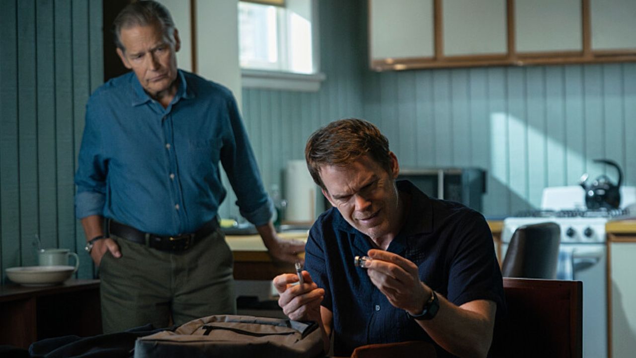 Harry and Dexter looking at evidence.