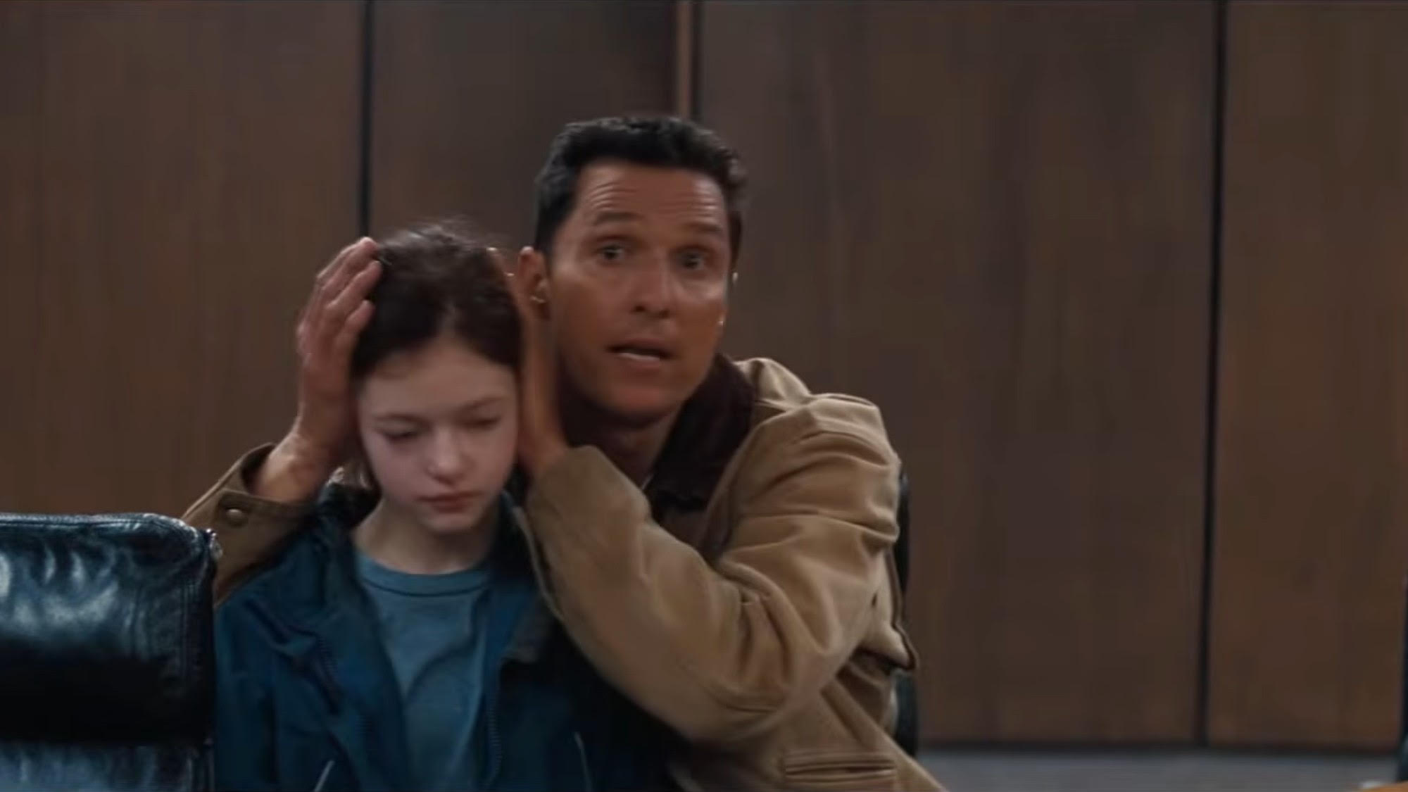 Matthew McConaughey covering Mackenzie Foy's ears in Interstellar