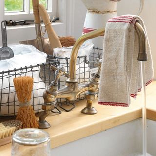 wash basin with hand towel and brushes