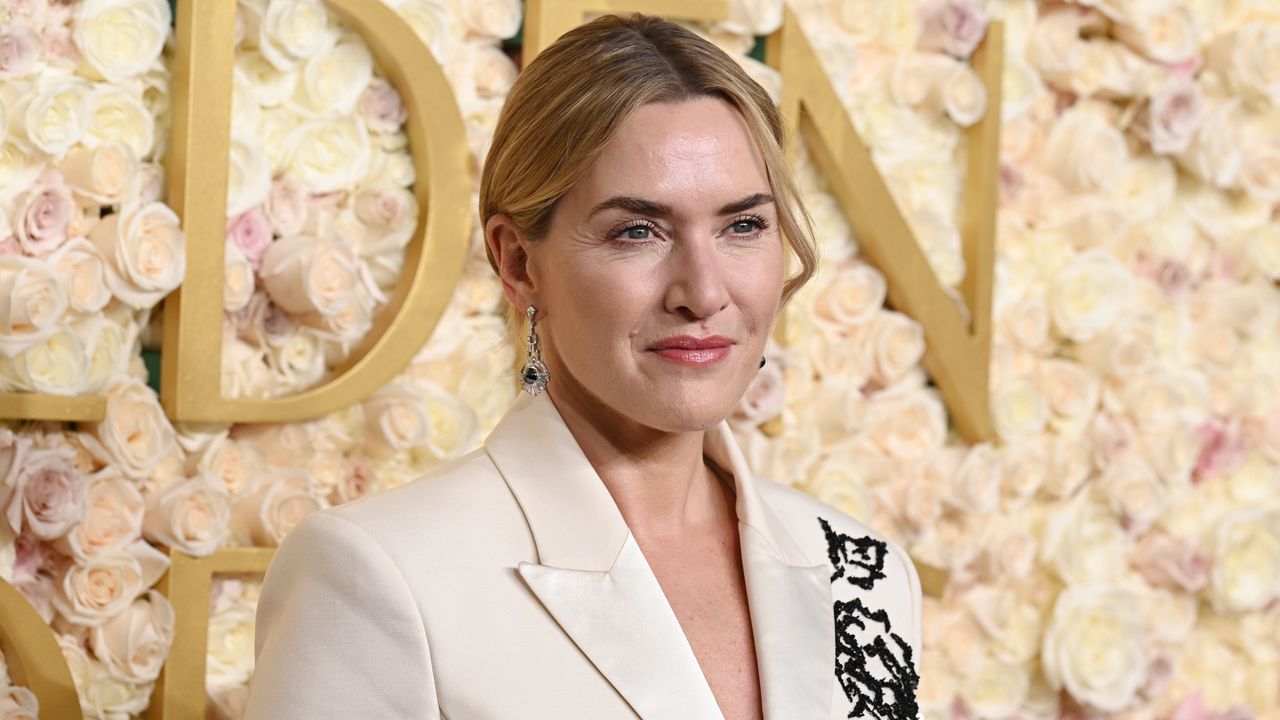 Kate Winslet wears an embroidered white suit at the 82nd Annual Golden Globes held at The Beverly Hilton on January 05, 2025