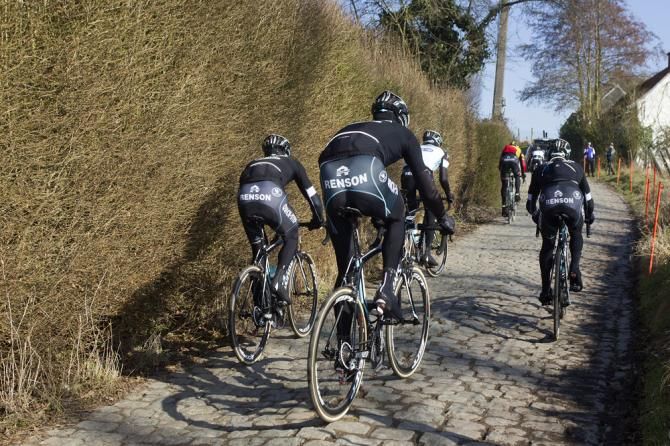 Omega Pharma-Quick Step riders climb the Molenberg.