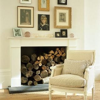 room with white chair cushion wall frame and wood storage