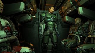 A marine addresses his squad inside a dropship in Quake 4: awakening
