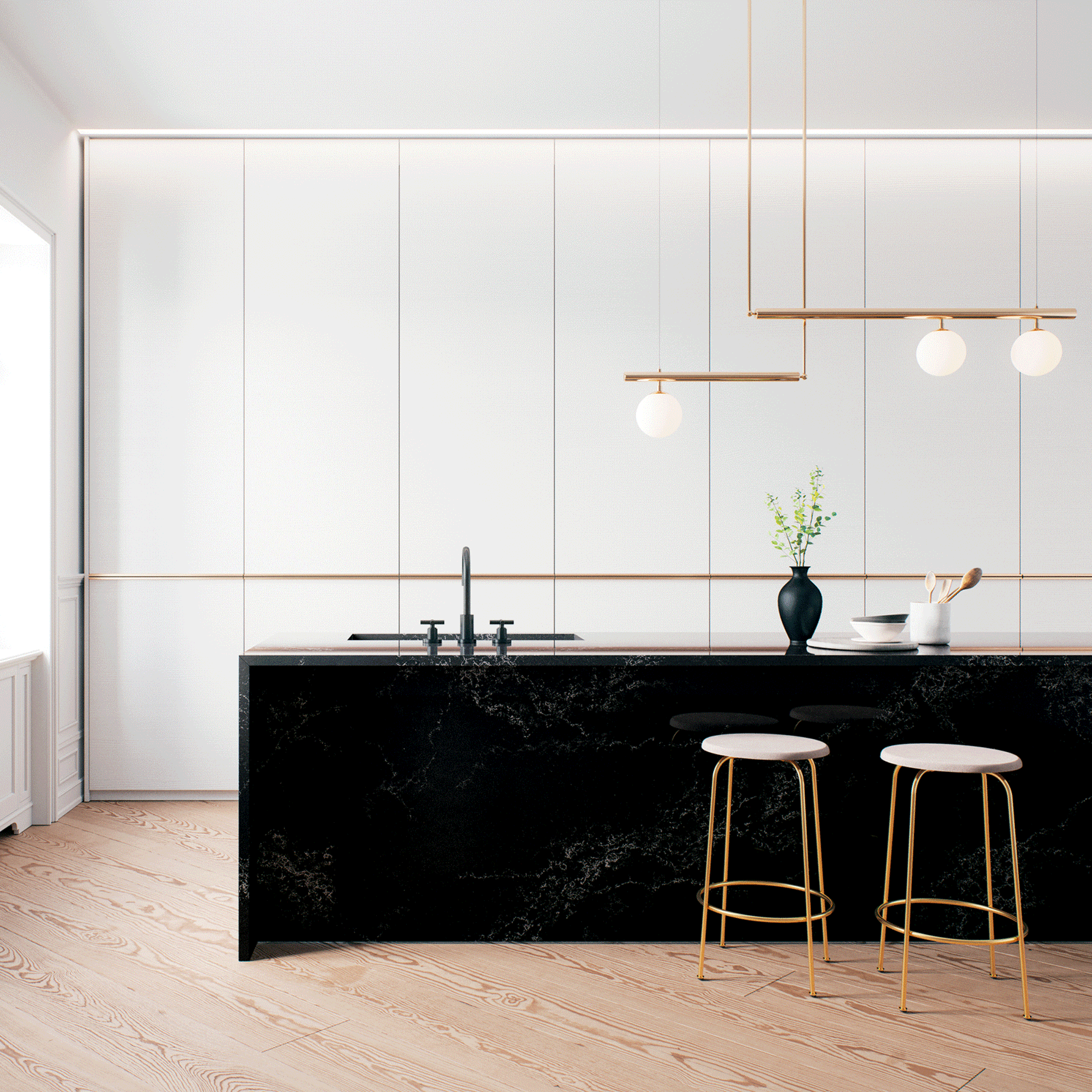 White kitchen with black marble island and brass statement light