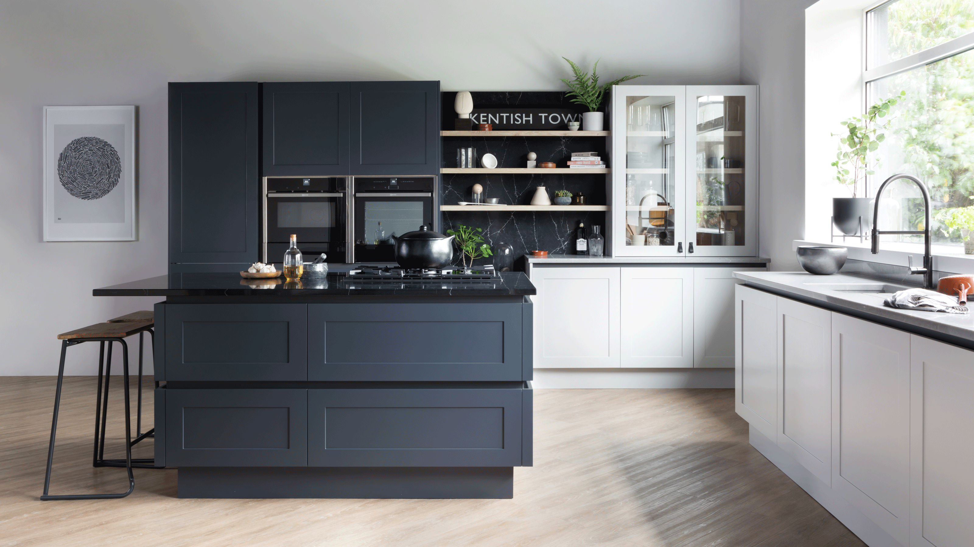 Two-tone kitchen with grey and white cabinets