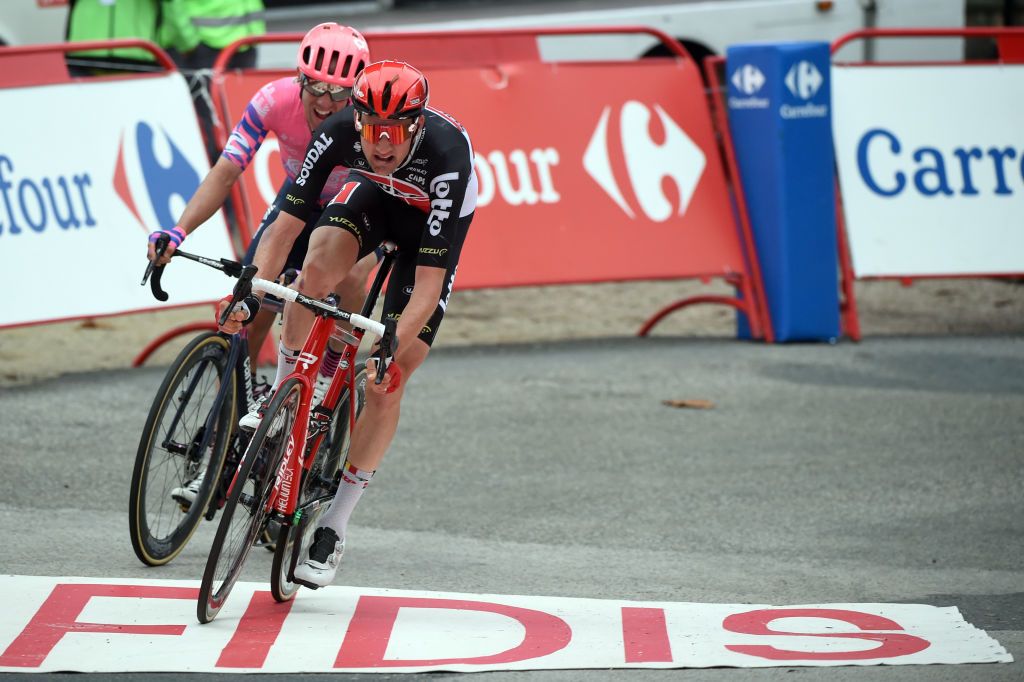Stage winner Team Lotto rider Belgiums Tim Wellens R sprints with Team Education First rider Canadas Michael Woods as they arrive to the finish line of the 14th stage of the 2020 La Vuelta cycling tour of Spain a 2047km race from Lugo to Ourense on November 4 2020 Photo by MIGUEL RIOPA AFP Photo by MIGUEL RIOPAAFP via Getty Images