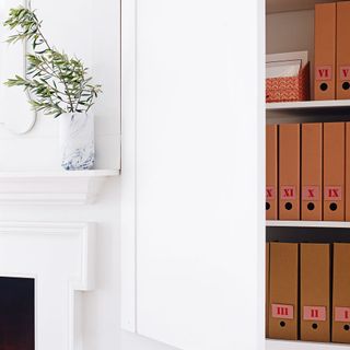folder shelves on white wall