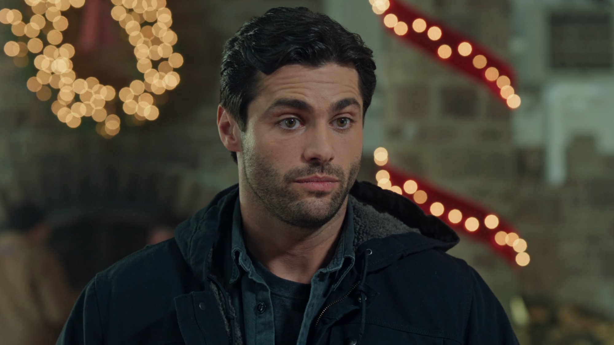 Matthew Daddario as Gabe DeLuca in Holiday Touchdown: A Bills Love Story.