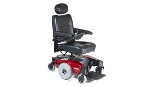 Best elecrtric wheelchairs: The Invacare Pronto M51 in black with a red base and large grey wheels