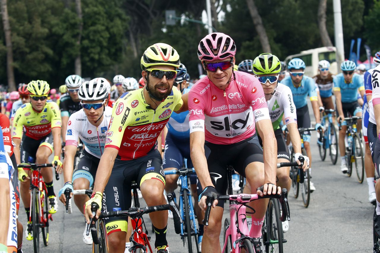 Giuseppe Fonzi, the lanterne rouge, with Giro d'Italia leader Chris Froome