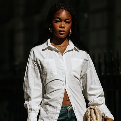 woman wearing white button-down shirt