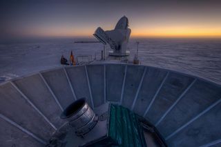 The Background Imaging of Cosmic Extragalactic Polarization 2 (BICEP2) experiment, shown here in the foreground, studies the cosmic microwave background from the South Pole, where cold, dry air allows for clear observations of the sky. In March 2014, the BICEP2 team announced that they had seen evidence of gravitational waves, offering what seemed to be "smoking gun" evidence of inflation. Although a Planck-BICEP2 joint analysis has since shown that dust in the Milky Way had mimicked the signal expected from gravitational waves, future experiments may yet discover these long-sought waves.