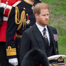 Prince William, Prince of Wales and Prince Harry, Duke of Sussex at Windsor Castle on September 19, 2022 in Windsor, England. The committal service at St George's Chapel, Windsor Castle, took place following the state funeral at Westminster Abbey. A private burial in The King George VI Memorial Chapel followed. Queen Elizabeth II died at Balmoral Castle in Scotland on September 8, 2022, and is succeeded by her eldest son, King Charles III