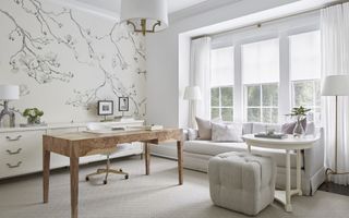white home office with botanical wallpaper and white sofa by Brad Ramsey