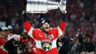 Matthew Tkachuk #19 of the Florida Panthers celebrates with the Stanley Cup after defeating the Edmonton Oilers in Game Six of the 2025 Stanley Cup Final at Amerant Bank Arena on June 17, 2025 in Sunrise, Florida.