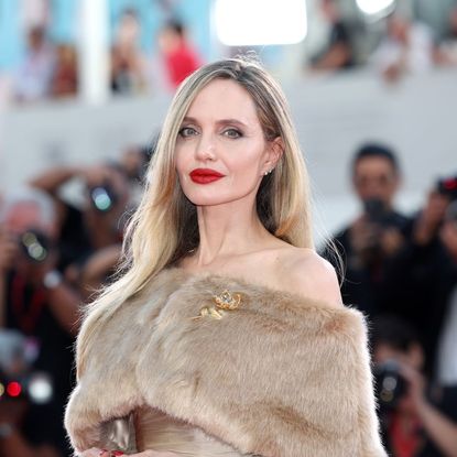 Angelina Jolie on the red carpet for 'Maria' at the 81st Venice International Film Festival