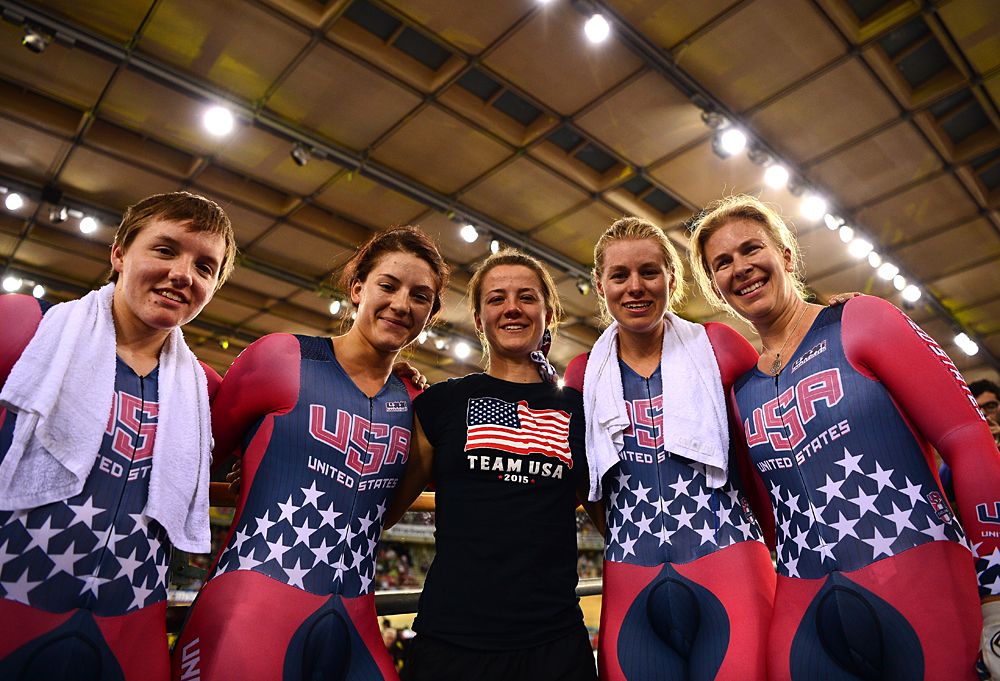 Kelly Catlin (L), Chloe Dygert (2nd L), Sarah Hammer (2nd R) and Jennifer Valente (R) of USA celebrate after winning the Women's Team Pursuit Final