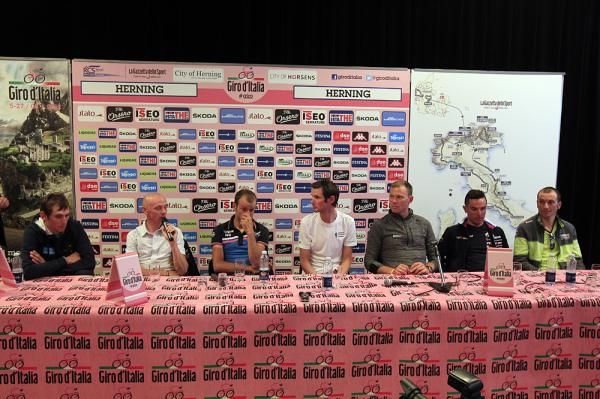 The press conference table was swathed in pink