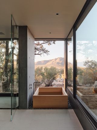 Bathtub with view at High Desert Retreat by Aidlin Darling Design
