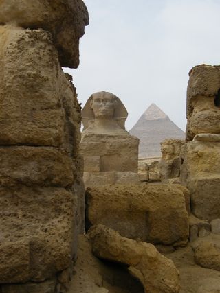 The Sphinx and the Great Pyramid of Giza, Egypt are pictured here. USGS and University of Pennsylvania research shows that ancient pollen and charcoal preserved in deeply buried sediments in Egypt's Nile Delta document the region’s ancient droughts and fires, including a huge drought 4,200 years ago associated with the demise of Egypt's Old Kingdom, the era known as the pyramid-building time.