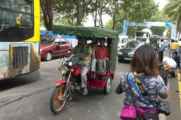 There was plenty of traffic still using the finishing straight in Haikou as the peloton made their way into the city.