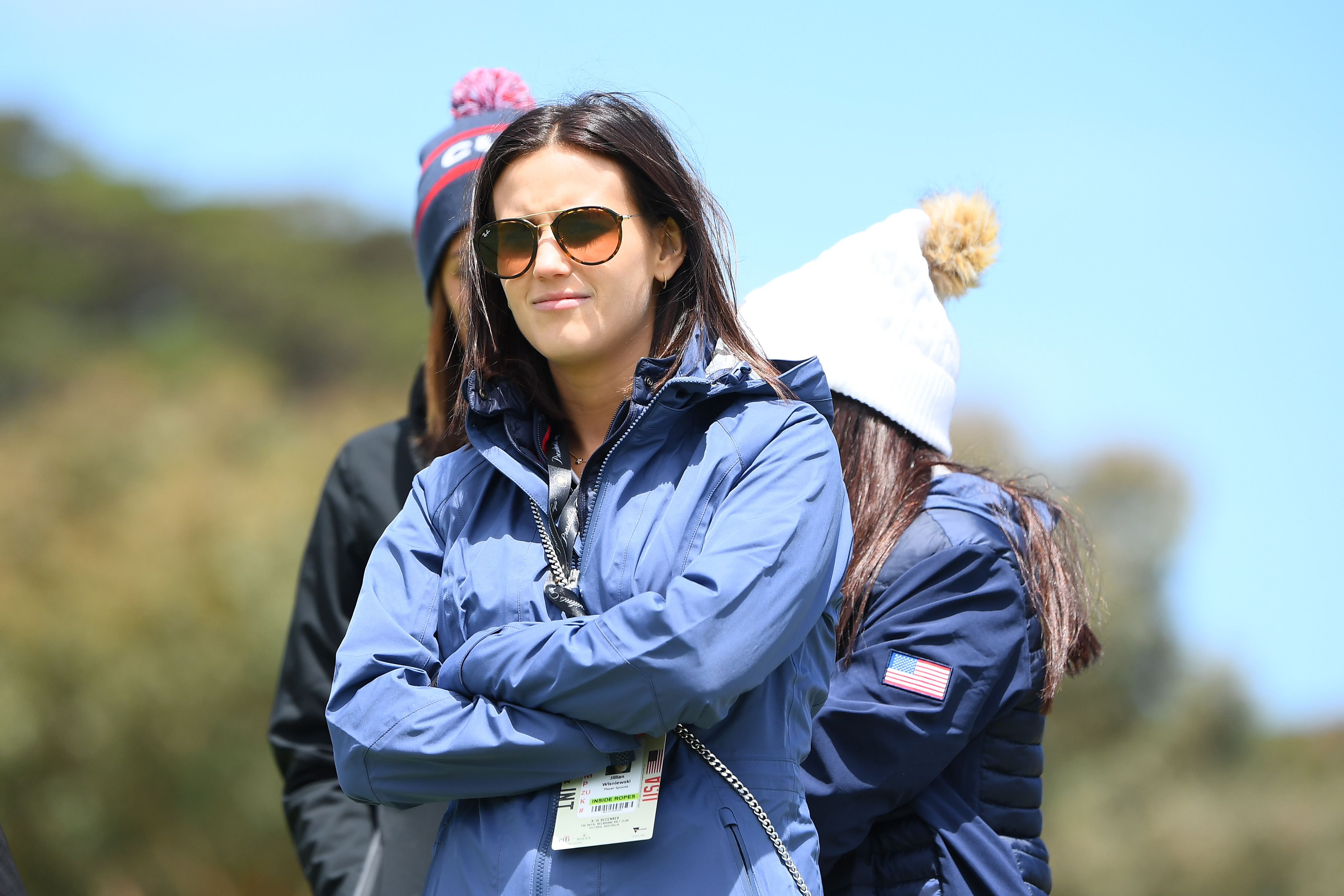 Jillian Wisniewski watches Justin Thomas