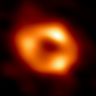 A red and orange ring in space.