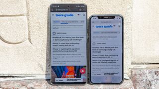 Samsung Galaxy S20 Ultra outside next to iPhone 11 Pro showing screen brightness difference