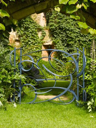 Metal gate in green garden