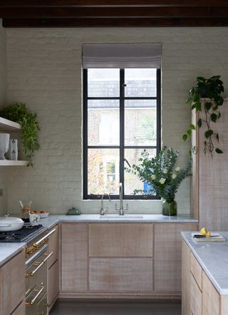Window in minimalist wooden kitchen