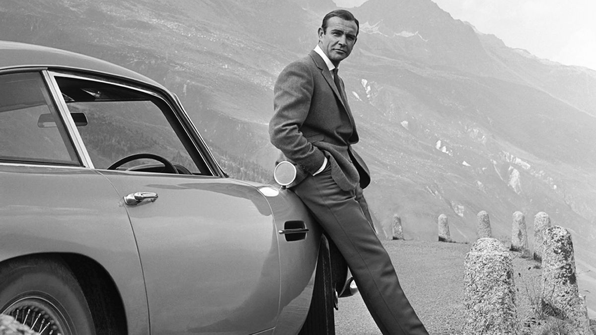 Sean Connery with the iconic Aston Martin DB5 in &quot;Goldfinger&quot; in 1964.