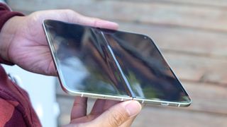 Google Pixel 9 Pro Fold held in the hand.