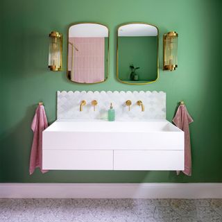 green bathroom with double vanity unit