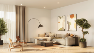 Living room with chevron-patterned wooden floor boards