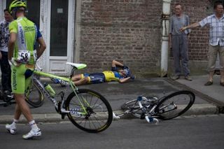 Peter Sagan (Liquigas-Cannondale) emerged from the crash in the stage 5 finale relatively unscathed while Jonathan Cantwell (Saxo Bank-Tinkoff) still remains dazed on the sidewalk.