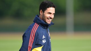 Arsenal manager Mikel Arteta laughs during a training session on 9 October, 2022 in London Colney, United Kingdom.