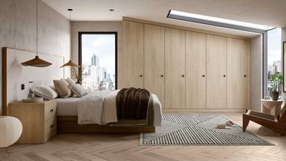 neutral bedroom with parquet floor and fitted wooden closet